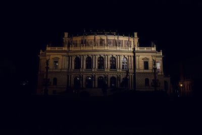 Low angle view of illuminated building at night