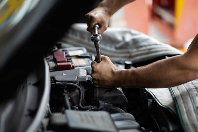 Man working in car