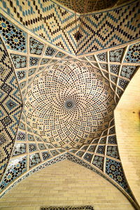 Directly below shot of ceiling of temple