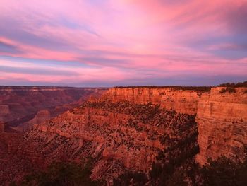 Scenic view of landscape against sky during sunset