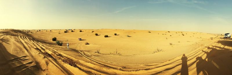 Panoramic view of desert against sky