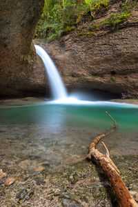 Scenic view of waterfall in forest