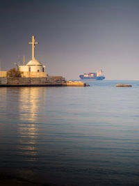 Ship in sea against sky