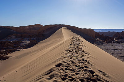 Scenic view of desert against sky