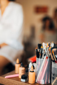 Close-up of brushes on table