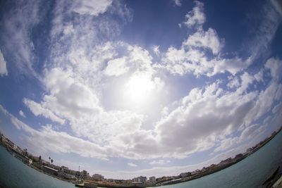 Scenic view of landscape against cloudy sky