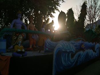 Sun shining through trees