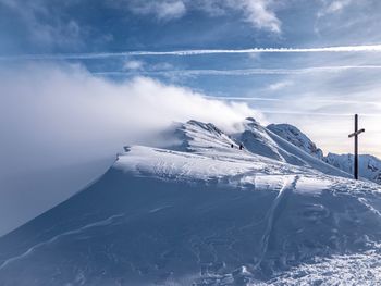 Snow covered mountain against sky