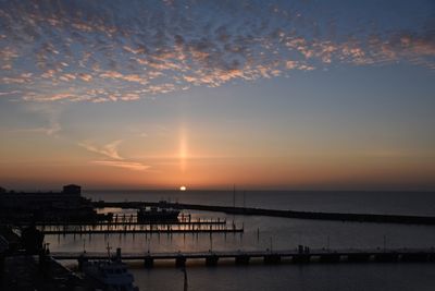 Scenic view of sea at sunset