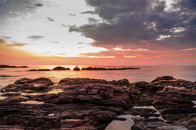 Scenic view of sea against sky during sunset