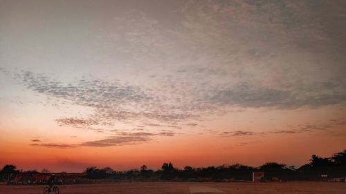 Scenic view of silhouette landscape against sky during sunset