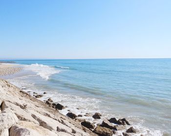 Scenic view of sea against clear sky