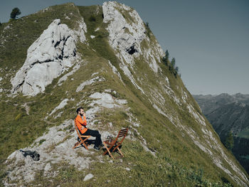 People on rock in mountains