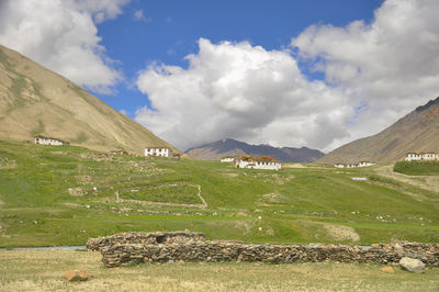 Beautiful landscape view of a tiny village in between dry mountains on the way of darcha-padum road