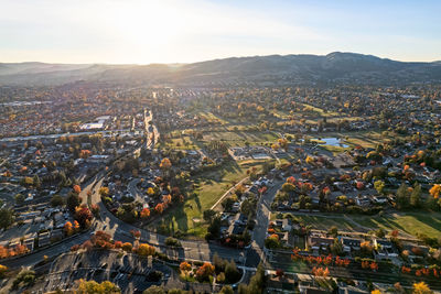 High angle view of townscape against sky during sunset