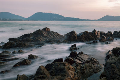 Scenic view of sea against sky during sunset