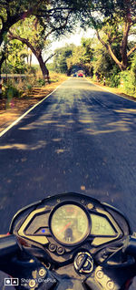 Road seen through windshield of car