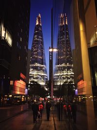 People in city at night
