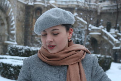 Portrait of young woman in snow