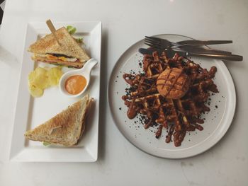 High angle view of breakfast served on table