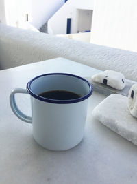 Close-up of coffee cup on table