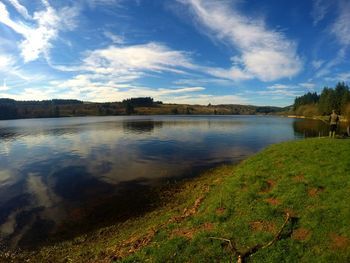 View of lake against cloudy sky