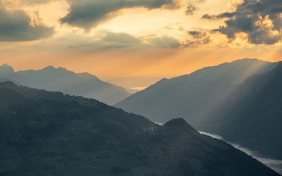 Scenic view of mountains against sky during sunset