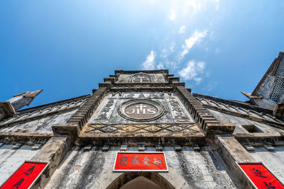 Low angle view of old building against sky