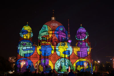 View of illuminated city at night