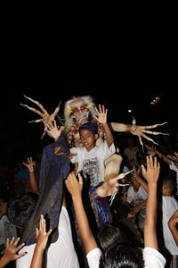 Group of people at music concert