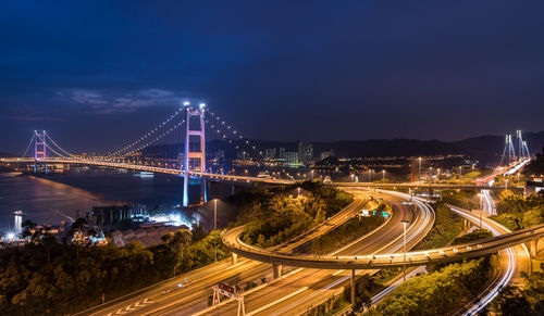 High angle view of suspension bridge at night