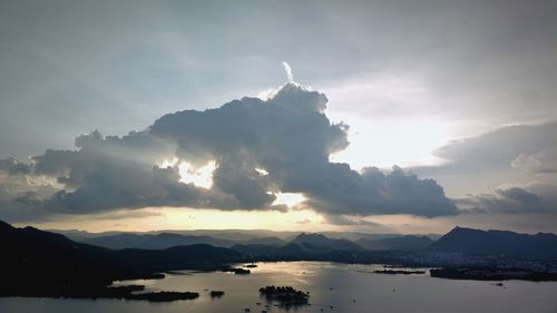 Scenic view of lake against sky during sunset