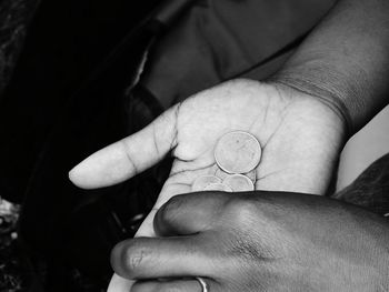 Close-up of hand holding hands