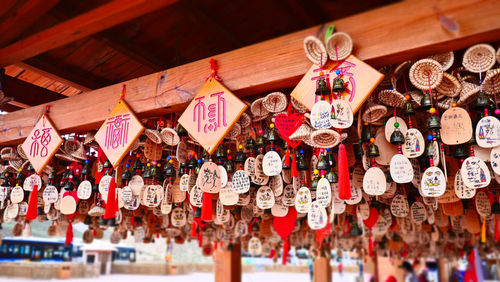 Close-up of decorations hanging on ceiling