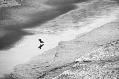 Person walking at beach