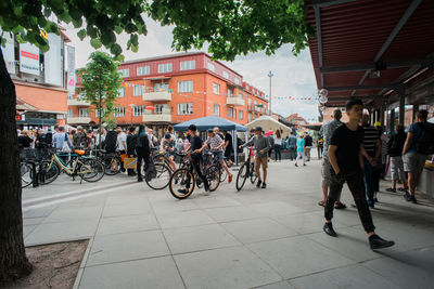 People on street in city