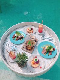 High angle view of fruits in plate on table