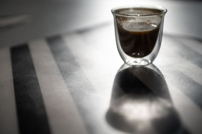 Close-up of beer glass on table