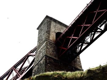 Low angle view of bridge against clear sky