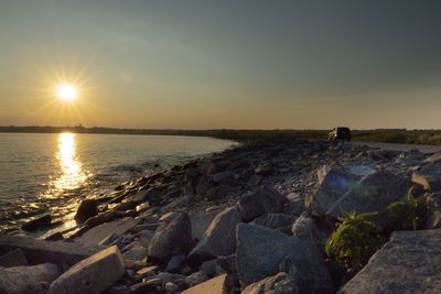 Scenic view of sea against sky during sunset