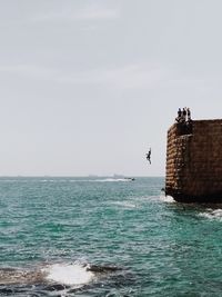 Scenic view of sea against clear sky