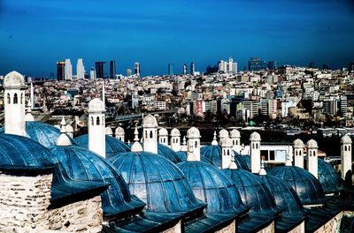 Cityscape against blue sky