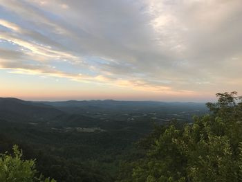 Scenic view of landscape against sky during sunset