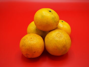 Close-up of apples on orange