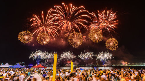 Firework display at night