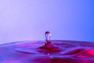 Close-up of water splashing against black background