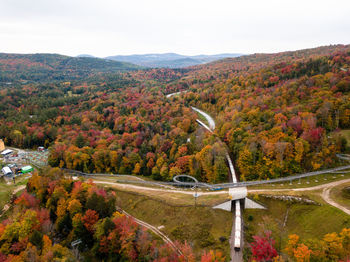 High angle view of trees on landscape against sky