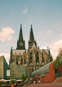 View of buildings in city against sky