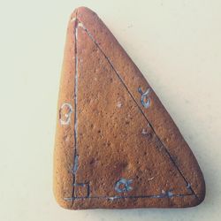 Close-up of rusty metal on table