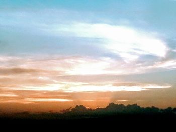 Scenic view of silhouette landscape against sky during sunset